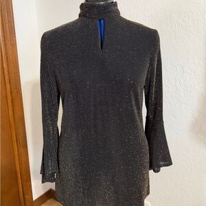 Black with gold threads for evening or party woman’s size medium never worn